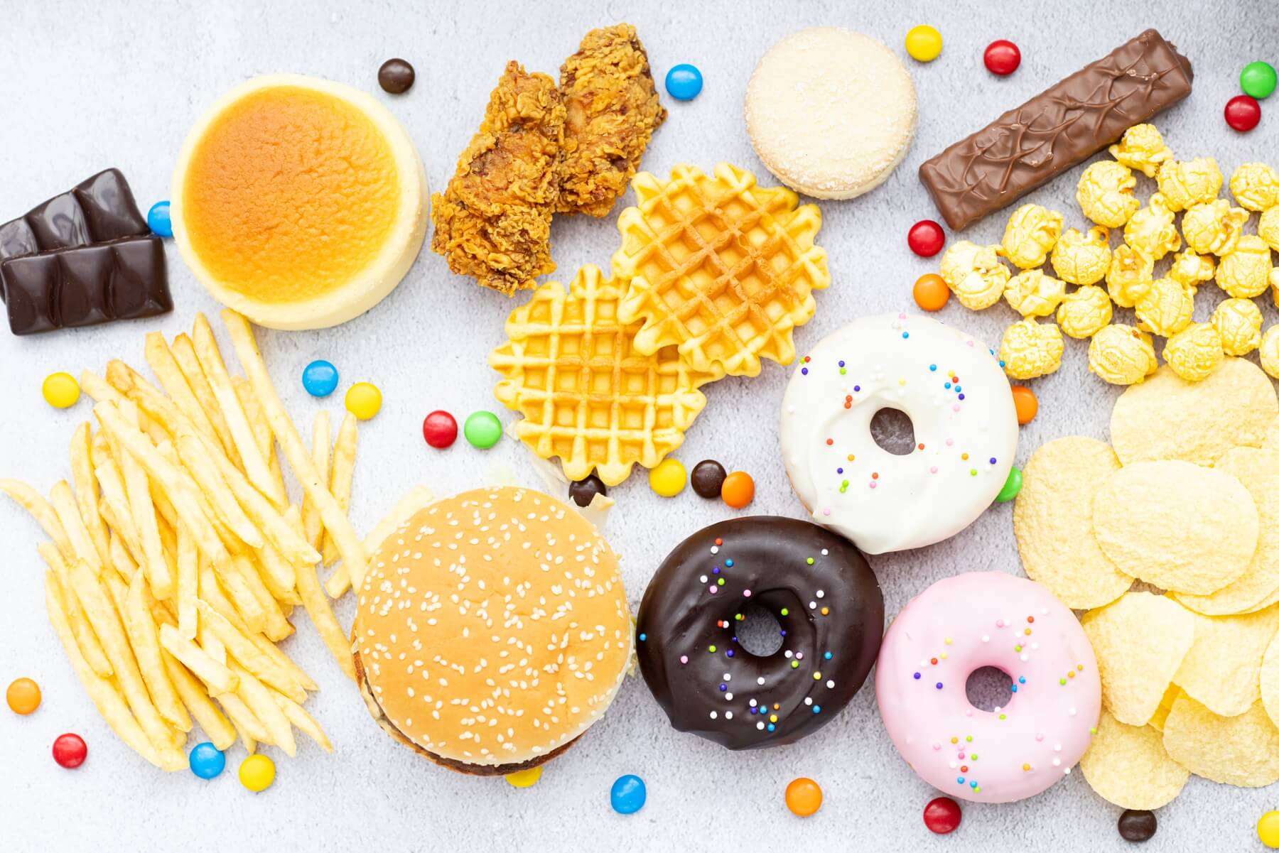 flat lay of unhealthy food from fast food sweets 2023 11 27 05 05 25 utc